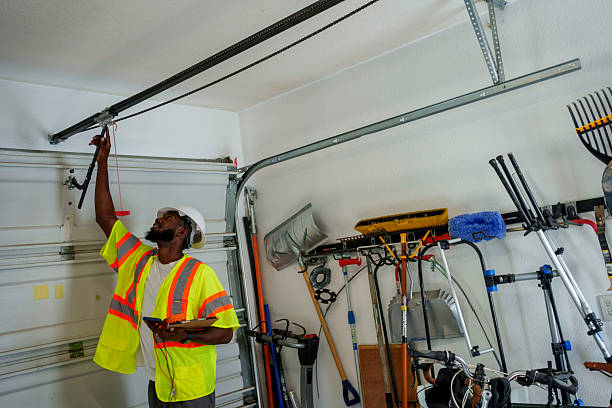 Professional Garage Door Installation technician working in Lewisburg, OH